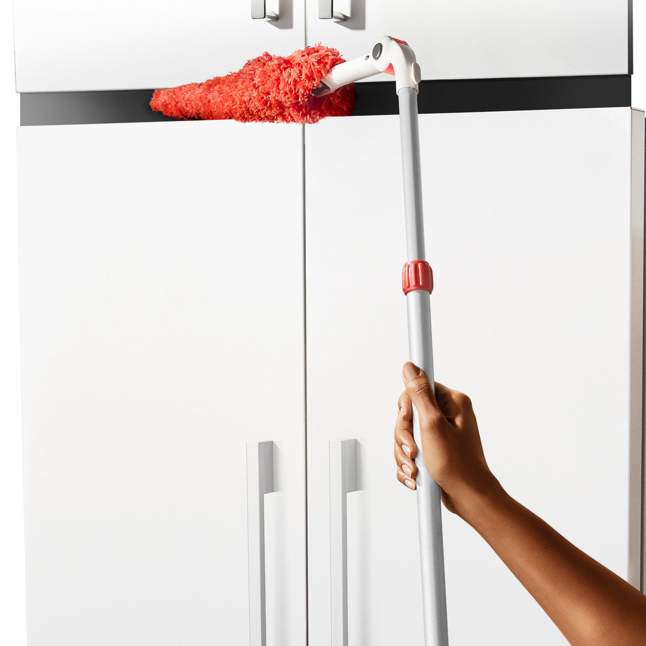Long Reach Dusting System With Pivoting Heads